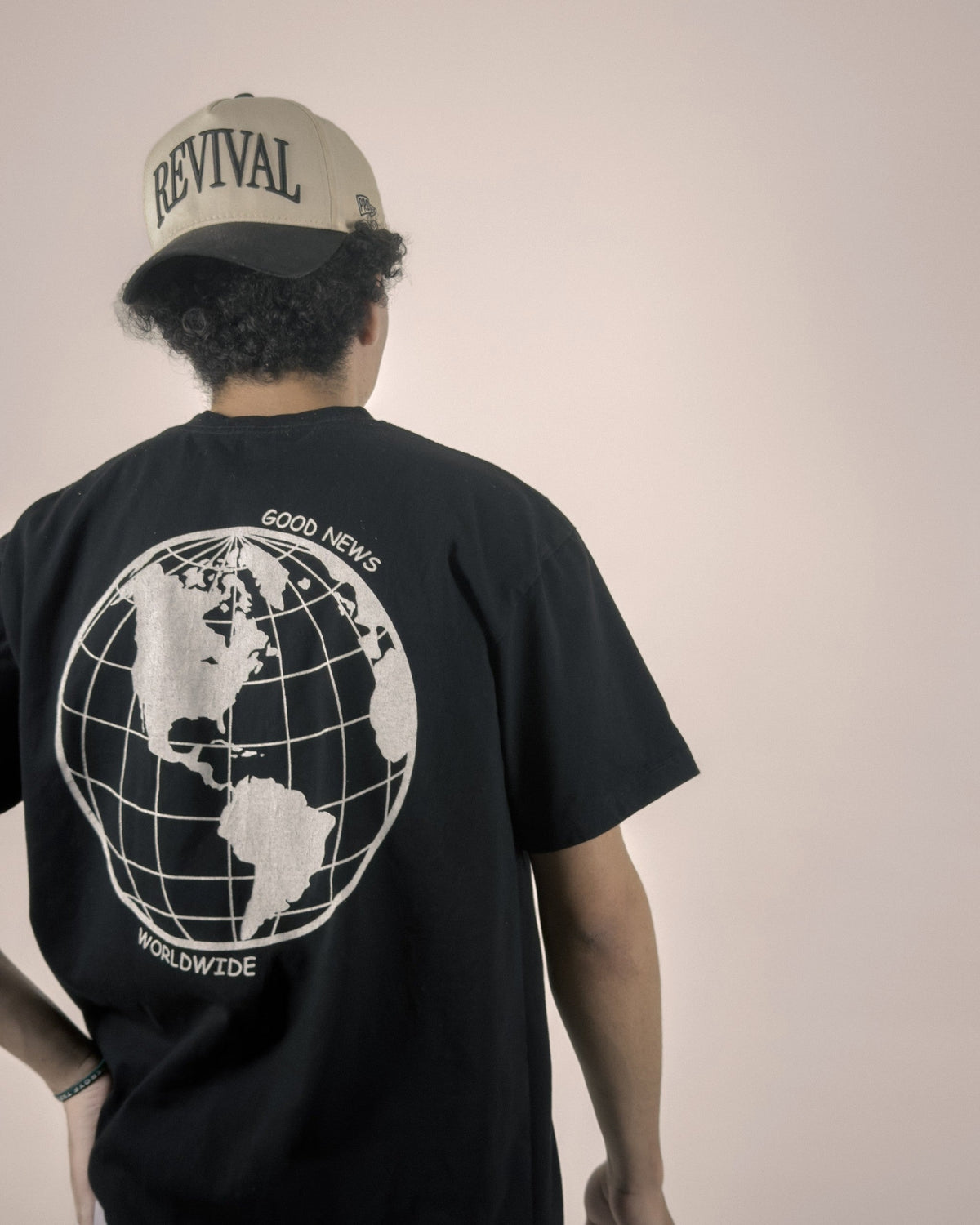 Tell The World Christian tee in black, back print